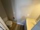 Compact half-bathroom with clean fixtures and fresh paint, maximizing space and functionality at 170 E Guadalupe Rd # 173, Gilbert, AZ 85234