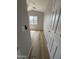 Bedroom showcasing a ceiling fan, neutral walls, and wood-style flooring at 170 E Guadalupe Rd # 173, Gilbert, AZ 85234