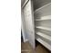 A walk-in closet features multiple shelves for maximum storage at 170 E Guadalupe Rd # 173, Gilbert, AZ 85234