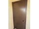 Plain brown door blends into the home's design at 170 E Guadalupe Rd # 173, Gilbert, AZ 85234