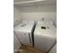 A laundry room closet features new Samsung washer and dryer appliances at 170 E Guadalupe Rd # 173, Gilbert, AZ 85234