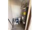 Water heater and paint supplies located in a utility closet at 170 E Guadalupe Rd # 173, Gilbert, AZ 85234