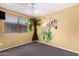 Bedroom featuring large window for natural light and colorful wall mural at 1715 S Cholla St, Mesa, AZ 85202