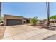 Single-story home with desert landscaping and attached garage at 1715 S Cholla St, Mesa, AZ 85202