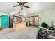 Open concept kitchen featuring a spacious tile floor, center island, and modern appliances at 1715 S Cholla St, Mesa, AZ 85202