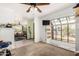 Living room featuring a ceiling fan, carpeted floor, and view to other rooms at 1715 S Cholla St, Mesa, AZ 85202