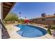 Backyard pool with a clean, blue finish at 1715 S Cholla St, Mesa, AZ 85202