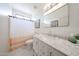 Elegant bathroom features a marble countertop, modern vanity, and serene decor at 18550 W Mcneil St, Goodyear, AZ 85338
