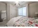 Calm bedroom with ceiling fan, plush carpet, large closet and bright natural light at 18550 W Mcneil St, Goodyear, AZ 85338