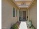Charming home entryway with decorative metal art and cozy seating at 18550 W Mcneil St, Goodyear, AZ 85338