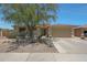 Inviting single-story home with a desert-landscaped front yard and attached two-car garage at 18550 W Mcneil St, Goodyear, AZ 85338