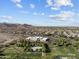 Extensive green space and community park surrounded by homes and scenic mountain views in a vibrant neighborhood at 21132 W Windsor Ave, Buckeye, AZ 85396