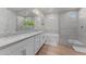 Modern bathroom with double vanity, separate shower, and soaking tub at 21132 W Windsor Ave, Buckeye, AZ 85396