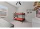 Bedroom with bunk beds, ceiling fan, window, carpet, and fun decorations at 21132 W Windsor Ave, Buckeye, AZ 85396