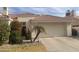 Charming single-story home featuring a two-car garage and drought-resistant landscaping at 2127 W Peninsula Cir, Chandler, AZ 85248