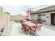 Spacious backyard patio with desert landscaping, an outdoor dining set and comfortable seating at 2725 E Mine Creek Rd # 1208, Phoenix, AZ 85024