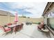 Inviting backyard patio with comfortable seating, a dining area, and desert landscaping at 2725 E Mine Creek Rd # 1208, Phoenix, AZ 85024