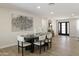 Elegant dining room with stylish table setting and natural light, great for entertaining or meals at 2802 E Mercer Ln, Phoenix, AZ 85028