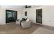 Covered patio with seating area for enjoying the outdoors at 2802 E Mercer Ln, Phoenix, AZ 85028