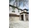 Two-story home with a two-car garage and covered front porch at 29891 N Desert Angel Dr, San Tan Valley, AZ 85143
