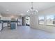 Open floor plan combines kitchen, dining, and living areas for a seamless living experience at 29891 N Desert Angel Dr, San Tan Valley, AZ 85143