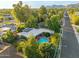 Stunning aerial view of the home and surrounding neighborhood with mountain views at 301 W Royal Palm Rd, Phoenix, AZ 85021