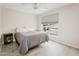 Comfortable bedroom with neutral tones, wood floors and a large window at 3126 W Stephens Pl, Chandler, AZ 85226