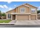 Charming two-story home with a three car garage, desert landscaping, and a well manicured lawn at 3126 W Stephens Pl, Chandler, AZ 85226