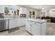 Modern kitchen with stainless steel appliances, granite countertops, and a view of the backyard at 3126 W Stephens Pl, Chandler, AZ 85226