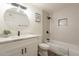 Stylish bathroom features tub, new fixtures, and decorative mirror at 3620 E Ludlow Dr, Phoenix, AZ 85032