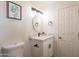 Updated bathroom with a new vanity, modern fixtures, and neutral paint at 3620 E Ludlow Dr, Phoenix, AZ 85032