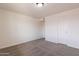 Vacant bedroom with neutral carpet and fresh white paint at 3620 E Ludlow Dr, Phoenix, AZ 85032