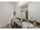Well-lit bathroom features double sinks, decorative tile accents, and modern fixtures at 4067 S White Dr, Chandler, AZ 85249