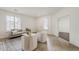 Bright living room featuring neutral decor, tiled floors, and a glimpse into connecting rooms at 4067 S White Dr, Chandler, AZ 85249