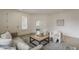 Comfortable living room featuring neutral colors, natural light, and an open floor plan at 4067 S White Dr, Chandler, AZ 85249