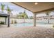 Inviting backyard featuring a sparkling pool, spa, covered patio and lush landscaping perfect for entertaining at 4067 S White Dr, Chandler, AZ 85249