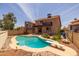 Wonderful backyard pool, diving board, and desert landscaping at 4114 E Muirwood Dr, Phoenix, AZ 85048