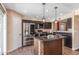 Modern kitchen with stainless steel appliances and granite countertops at 4114 E Muirwood Dr, Phoenix, AZ 85048