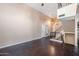 Bright and spacious living room with modern staircase and open floor plan at 4114 E Muirwood Dr, Phoenix, AZ 85048