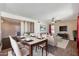 Inviting combined living and dining area with access to the kitchen at 4114 E Muirwood Dr, Phoenix, AZ 85048