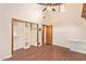 Open bedroom with closet and door at 4922 W Fallen Leaf Ln, Glendale, AZ 85310