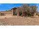 Beautiful desert home with drought-resistant landscaping and a three-car garage at 4922 W Fallen Leaf Ln, Glendale, AZ 85310
