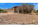 Beautiful desert home with drought-resistant landscaping and a three-car garage at 4922 W Fallen Leaf Ln, Glendale, AZ 85310