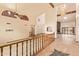 Spacious living room featuring tile floors, wood beams, and chandelier at 4922 W Fallen Leaf Ln, Glendale, AZ 85310
