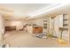 Unfinished space featuring exposed beams and cabinets; ideal for customization and renovation at 4922 W Fallen Leaf Ln, Glendale, AZ 85310