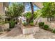 Lush courtyard adorned with trees and planters, providing a tranquil outdoor experience at 5200 S Lakeshore Dr # 206, Tempe, AZ 85283