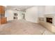 Bright living room with a fireplace and wet bar, perfect for entertaining at 5200 S Lakeshore Dr # 206, Tempe, AZ 85283