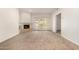 Comfortable living room featuring a fireplace and access to outdoor space through sliding doors at 5200 S Lakeshore Dr # 206, Tempe, AZ 85283
