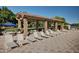 Community patio area with ample seating and shade structures, great for social gatherings at 5200 S Lakeshore Dr # 206, Tempe, AZ 85283
