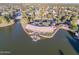 Aerial view of waterfront restaurant with patio, palm trees, and ample parking at 5200 S Lakeshore Dr # 206, Tempe, AZ 85283